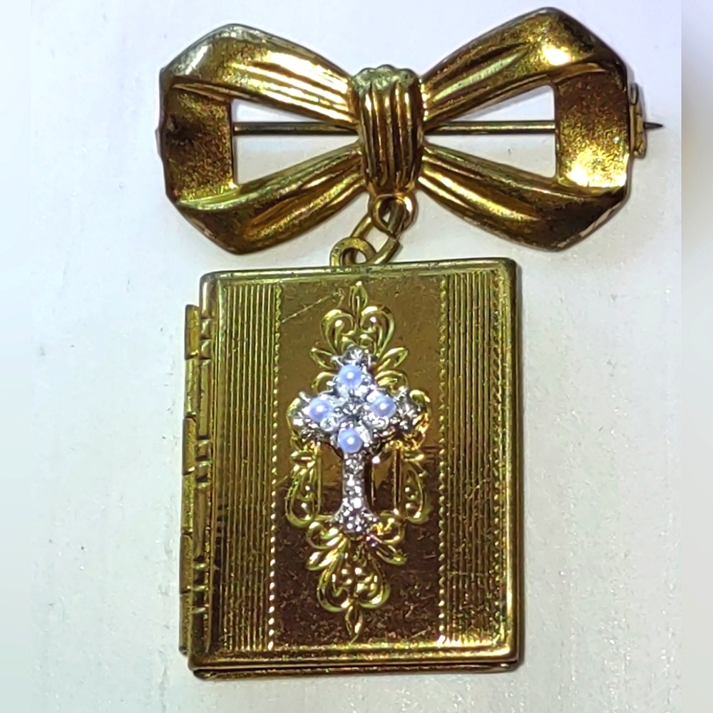 Holy Book Hanging From Bow Brooch Locket Crystal Cross